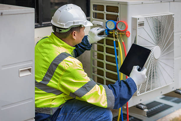 Professional Air Conditioning Repair technician working in Hudson, NY